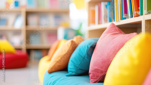 Vibrant bean bags sit in cheerful library corner