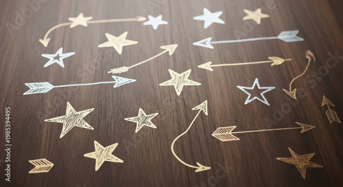 Stars and arrows drawn on a wooden surface, symbolizing direction, goals, and pathways.