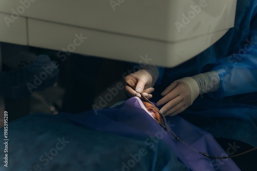 Fotografie Ophthalmologist performing eye surgery on patient for vision improvement