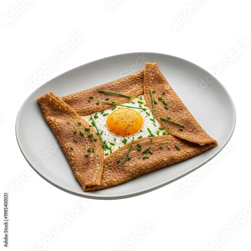 Savory crepe with fried egg and chives on transparent background plate