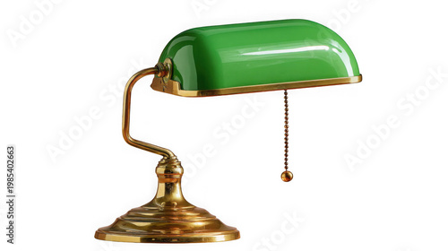 A vintage green and gold desk lamp with a chain pull on a black background