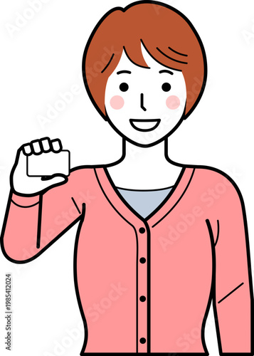 正面向き。カードを持つカーディガンを着た若い女性。