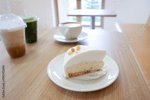 coconut tart or coconut cake or sponge cakeor coconut tart with macadamia and hot coffee