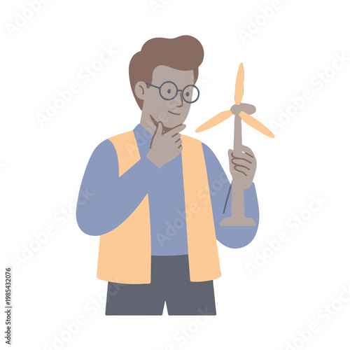 Man holding miniature wind turbine and thinking deeply indoors