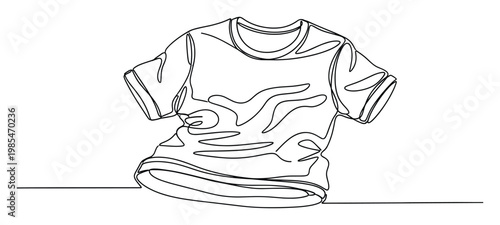 Continuous line drawing of a comfortable shortsleeved tshirt symbolizing minimalist fashion and effortless style, perfect for apparel branding, clothing shop advertisements, or casual wear