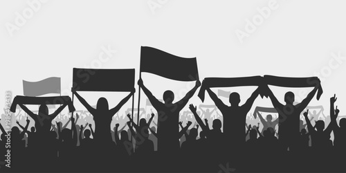 Protesters hold flags high in a crowded demonstration at night