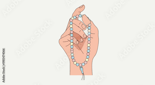 Hand holding a rosary beads.