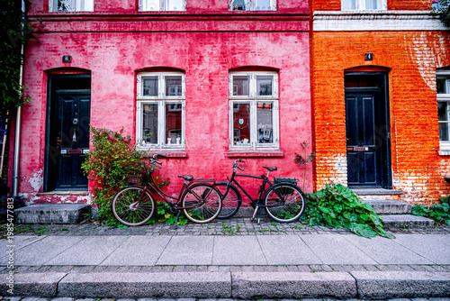 Photography Two vintage bikes, colorful houses Copenhagen, Denmark.