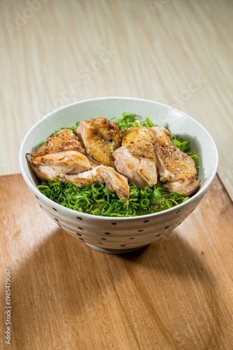 grilled chicken rice bowl with onions