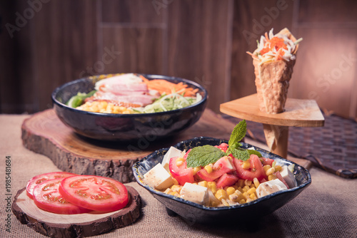 Fresh salad bowl with tofu and corn