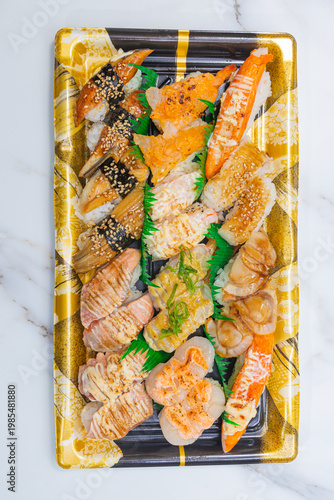 Assorted seared sushi nigiri on party tray