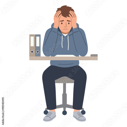 A frustrated man sitting at a desk with his hands on his head
