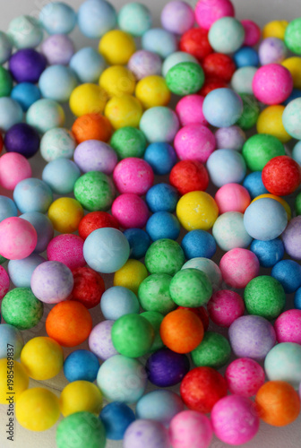 Scattered Sugar Balls Candies Isolated On White Flat Lay Image 
