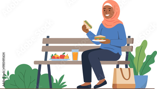 A woman wearing a headscarf sits on a bench eating a sandwich outdoors.