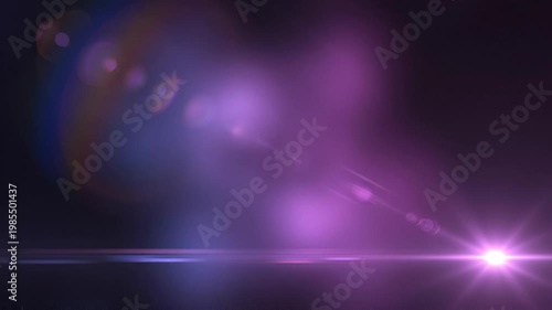 Elegant lens flare on black backdrop concept. Bright purple lens flare with abstract glowing light and reflections on dark background