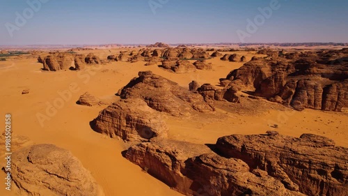 Landscape of Saudi Arabia in AlUla region. Arabic Peninsula aerial view with sandstone rock formations and sand dunes in desert