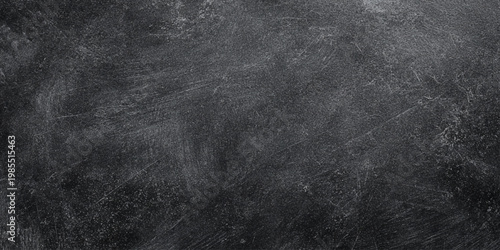 Dark wall gray scratched and distressed texture background with vintage feel for design and decoration