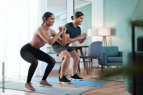 Foto Smile, couple and squat for fitness at house with exercise, strength training and bonding together