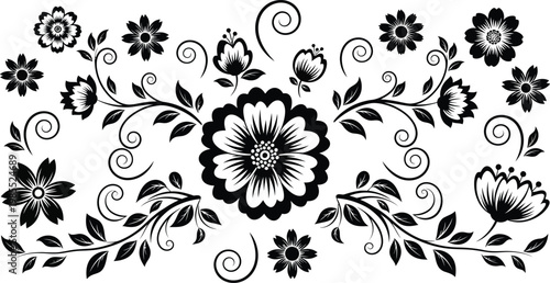 Black and white floral with large central flower and swirling vines