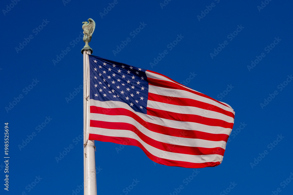 Obraz premium Flag American waving in clear horizon. American patriotic freedom banner on flag. USA democracy liberty symbol in flag. American independence culture on flag.
