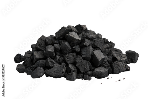A pile of dark gray charcoal pieces, isolated on a black background, textured and irregular