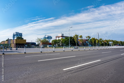 Wallpaper Mural container terminal at Anqing port with asphalt road in the foreground Torontodigital.ca
