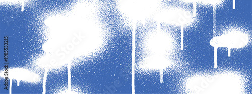 White spray paint splatters on blue background with street art brush stroke paint splash modern art paint blobs paint drop graffiti abstract background splatter creative backdrop