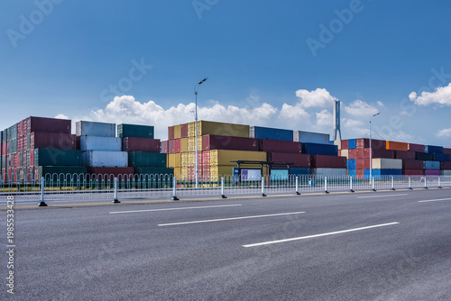 Wallpaper Mural container terminal with stacked shipping containers and road Torontodigital.ca