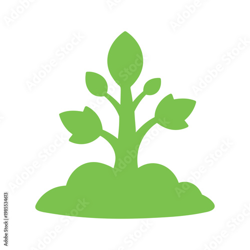 Bright green sapling emerging from the ground on a clear day