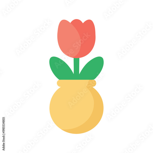 Delicate tulip blossom in a yellow vase brings a touch of spring cheer
