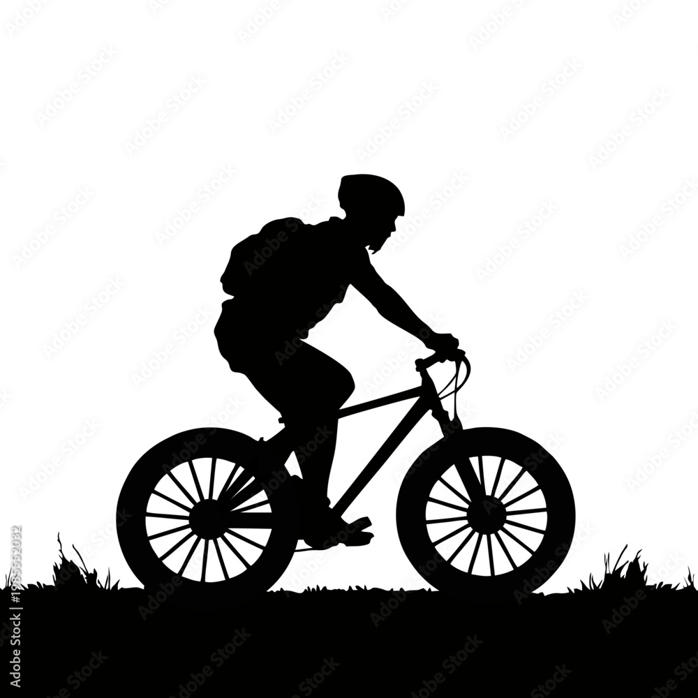 Fototapeta premium silhouette of a cyclist riding a mountain bike