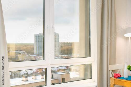 Fotografi Window in a large room, window washing, clean glass