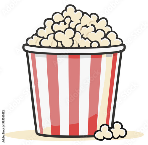 Classic striped popcorn bucket filled with fluffy popcorn and loose kernels on the side