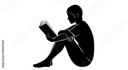 Person sitting and reading book.