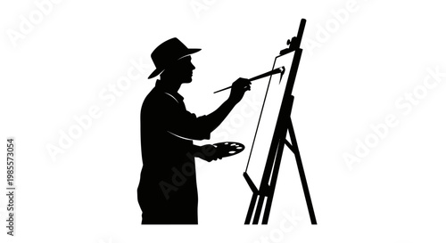 Silhouette of a male painter working.