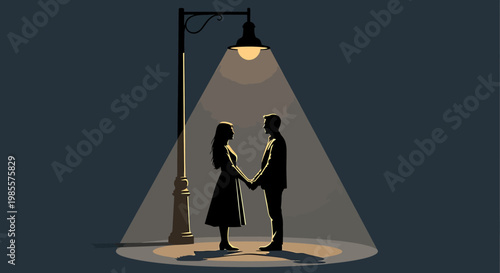 Couple holding hands under a street lamp at night.