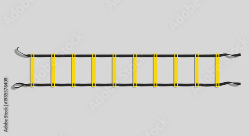 Agility ladder for speed and footwork training drills in yellow and black; a flat lay image for fitness exercises