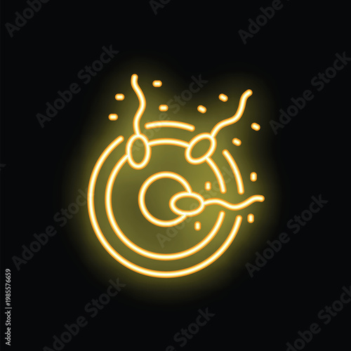 Yellow neon style icon of sperms fertilizing an egg cell, representing human fertilization