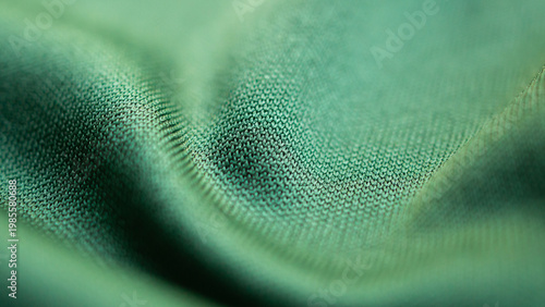 Foto Green sports clothing fabric football shirt jersey texture close up