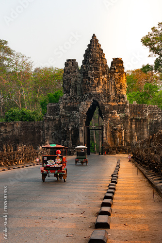 South Gate of ancient temple complex with traffic passing through
