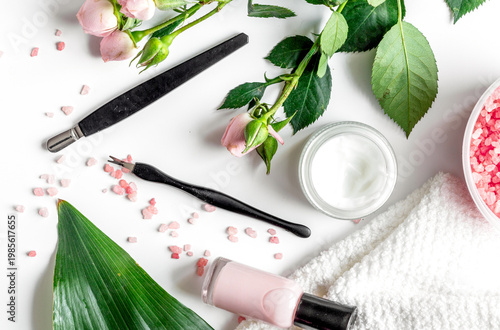 salt and cream for nail care in spa top view