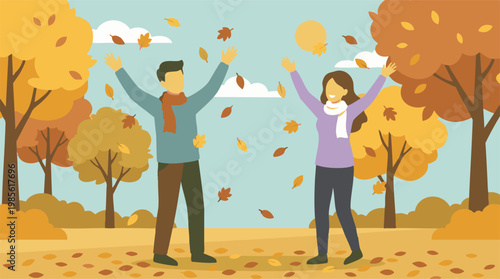 Joyful couple playing with falling autumn leaves in park