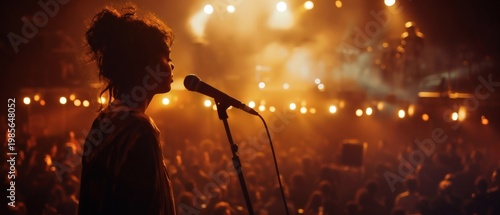 On the stage, the singer passionately performs