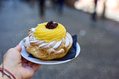 Zeppola.Traditional Italian dessert, pastries iin Naples , Italy.Typical Neapolitan pastry product