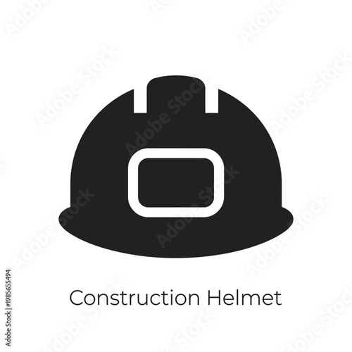A black construction helmet with a white visor Vector