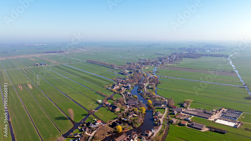 Winding river with residential development on both sides in Europe