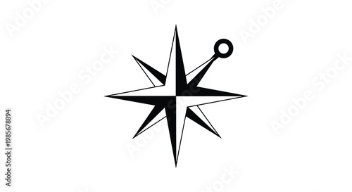 A striking black and white depiction of a nautical star with a circular element presented as a silhouette