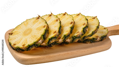 Fresh pineapple slices arranged on a wooden cutting board, isolated on transparent background