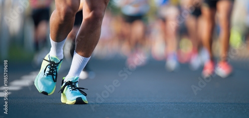 Marathon running race, people feet on city road, runners run urban marathon in the the city