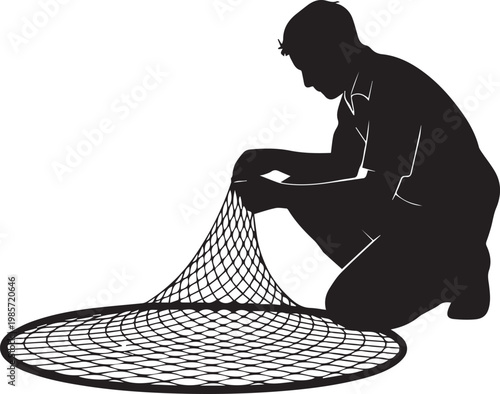 A person carefully mending a large fishing net on the ground